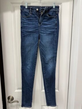 American Eagle Medium Wash High Rise Jegging Next Level Stretch Size 4 Long